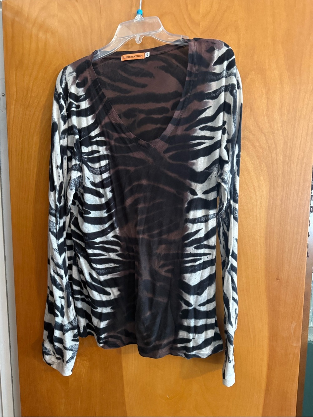 Zebra-Print V-Neck Long Sleeve Top in Black and White